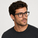 Model wearing Atlas Square Optical Frames in a natural lifestyle setting