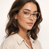 Model wearing Luna Cat-Eye Optical Frames in a natural lifestyle setting