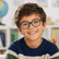 Child wearing Mini Flex Kids Frames in a natural lifestyle setting