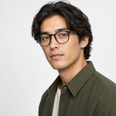 Model wearing Rowan Round Optical Frames in a natural lifestyle setting