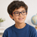 Child wearing Scout Kids Optical Frames in a natural lifestyle setting