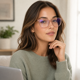 Model wearing Willow Blue Light Glasses in a natural lifestyle setting