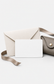 Eyra eyewear gift card with envelope, ribbon, and glasses case accent