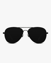 Vela Aviator Sunglasses in Black and Green, front view on a light gray studio background