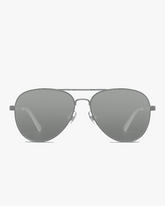 Vela Aviator Sunglasses in Silver and Smoke, front view on a light gray studio background